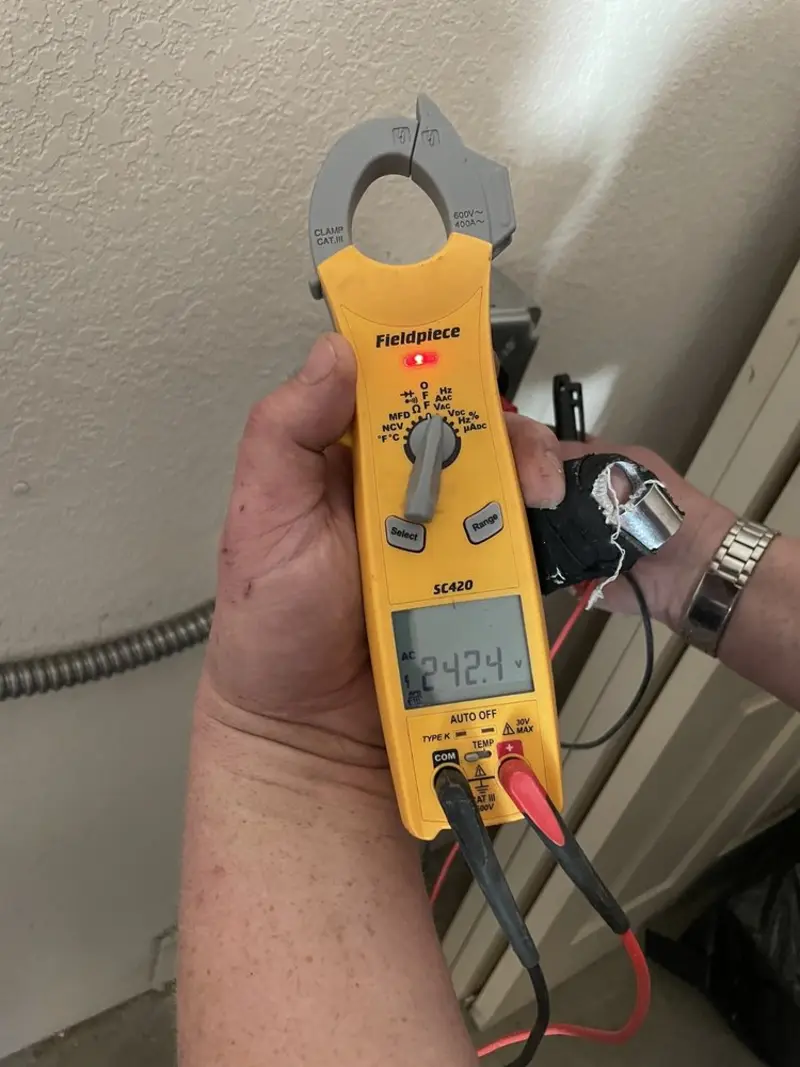 Voltage testing with clamp meter during Ceiling Fan Installation in Prestonsburg